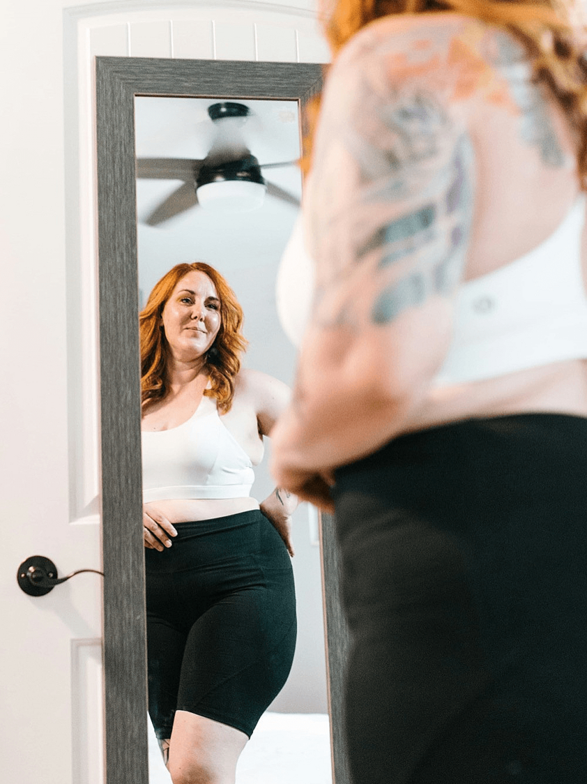 Woman happy with her weight loss journey